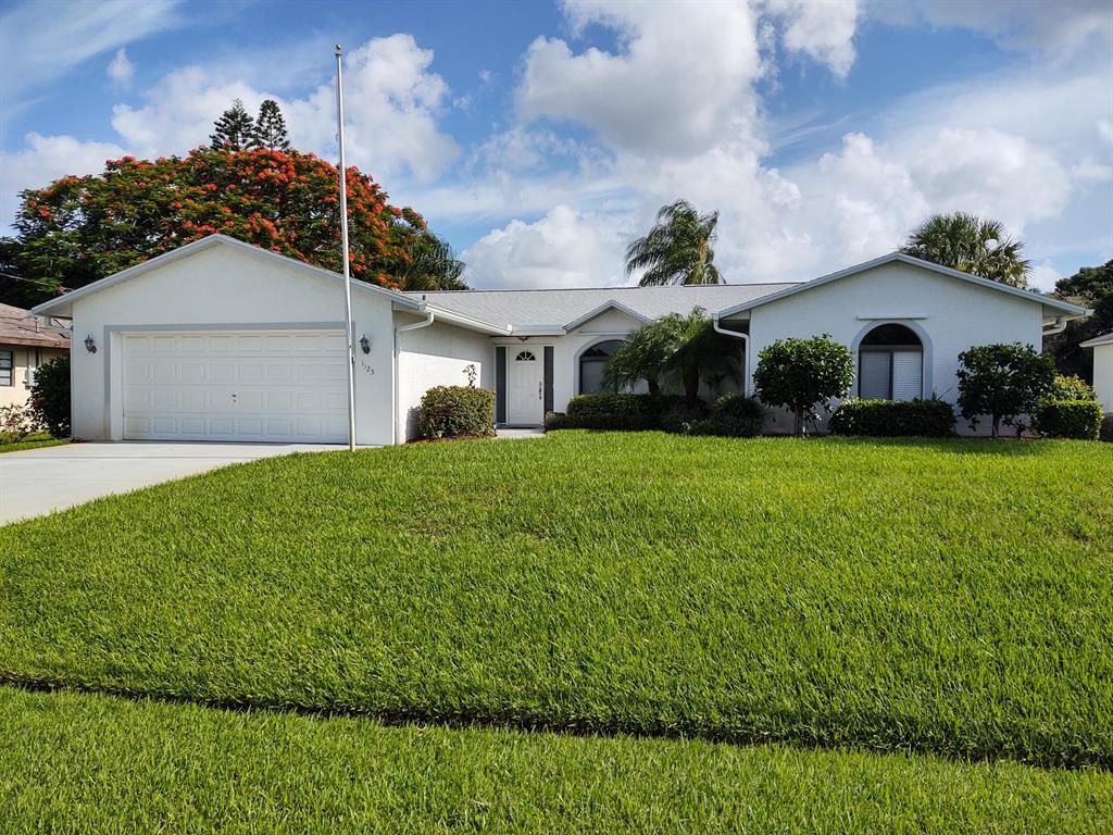 Photo of 1125 SE Palm Beach Road, Port Saint Lucie, FL 34952 (MLS # R10732106)
