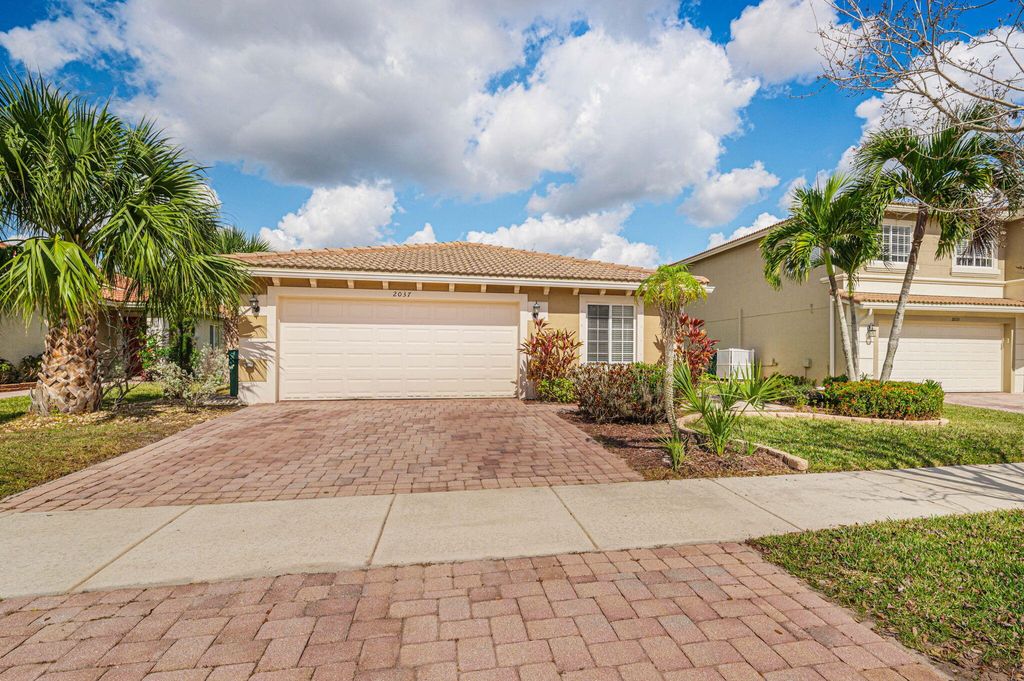 Photo of 2037 SW Providence Place, Port Saint Lucie, FL 34953 (MLS # B26019388)