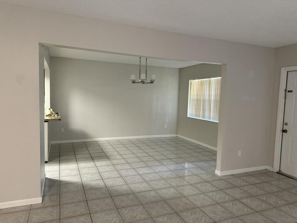 Photo of 122 Weybridge Circle #C, Royal Palm Beach, FL 33411 (MLS # R11117168)