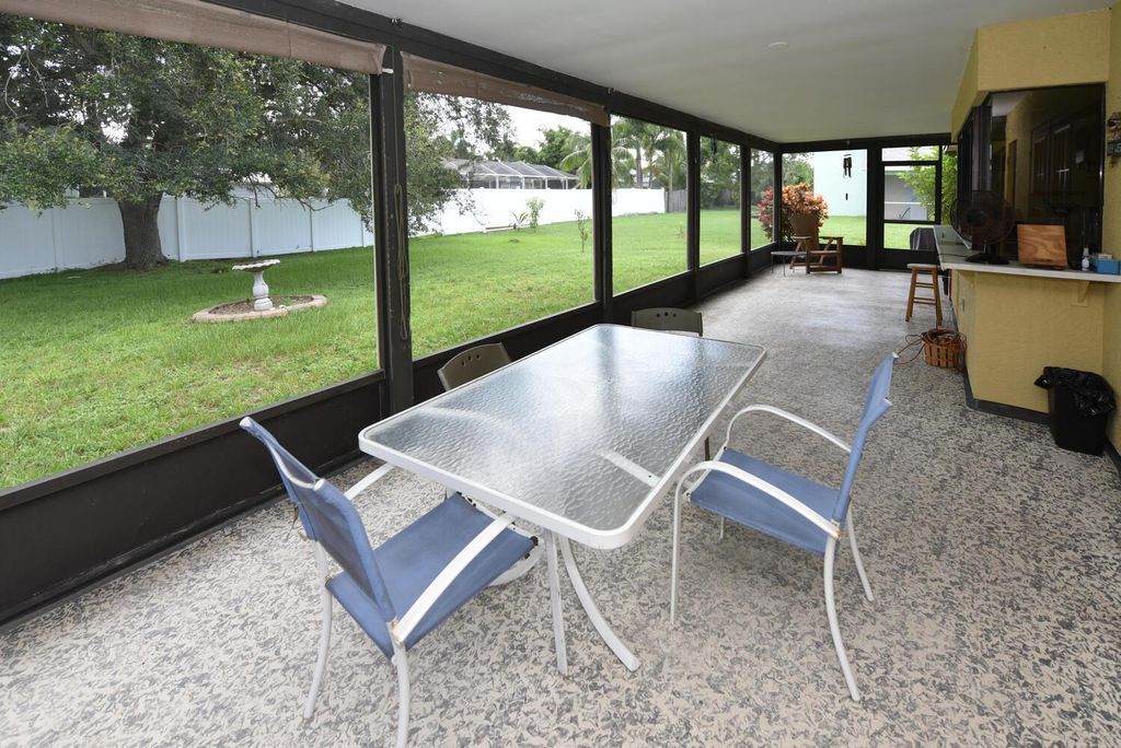 Photo of 6811 NW Garbett Street, Port Saint Lucie, FL 34983 (MLS # R11009221)