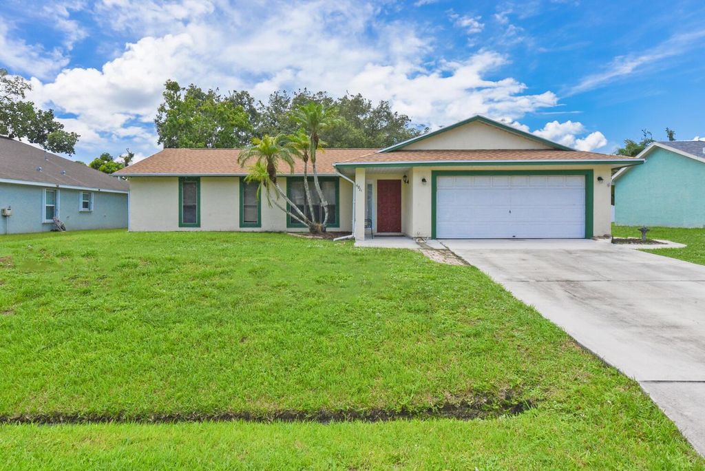 Photo of 6811 NW Garbett Street, Port Saint Lucie, FL 34983 (MLS # R11009221)