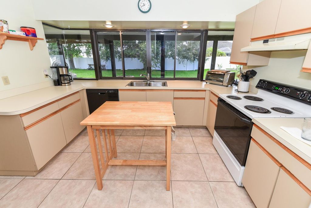 Photo of 6811 NW Garbett Street, Port Saint Lucie, FL 34983 (MLS # R11009221)