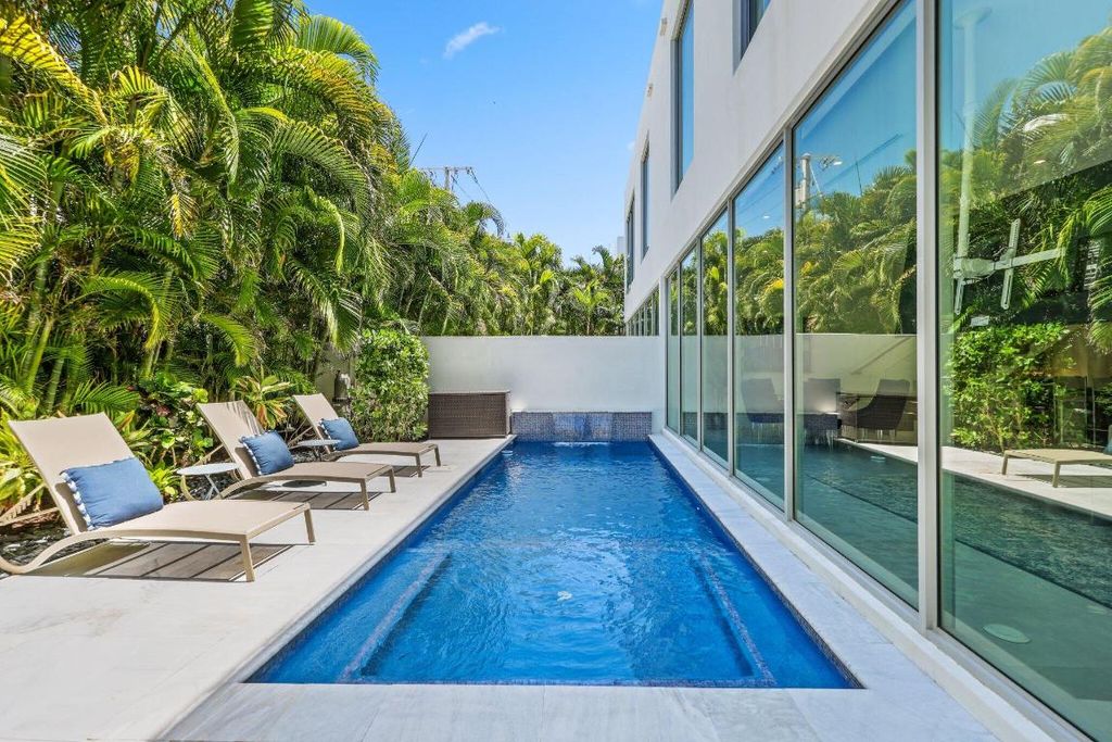 Photo of 3000 Banyan Road #A, Boca Raton, FL 33432 (MLS # R11124536)