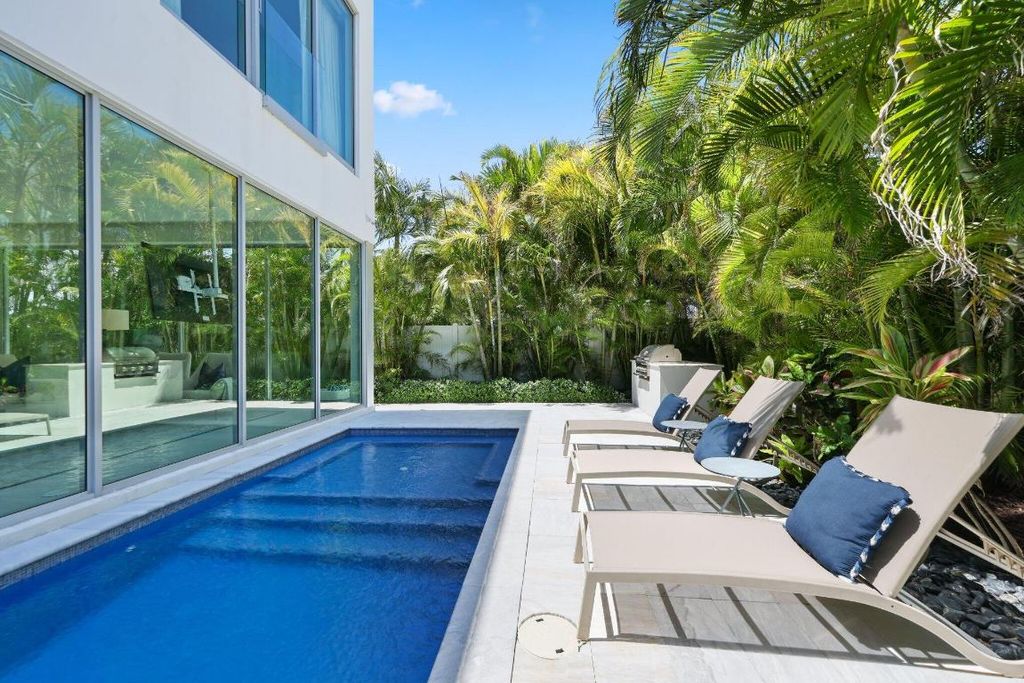 Photo of 3000 Banyan Road #A, Boca Raton, FL 33432 (MLS # R11124536)