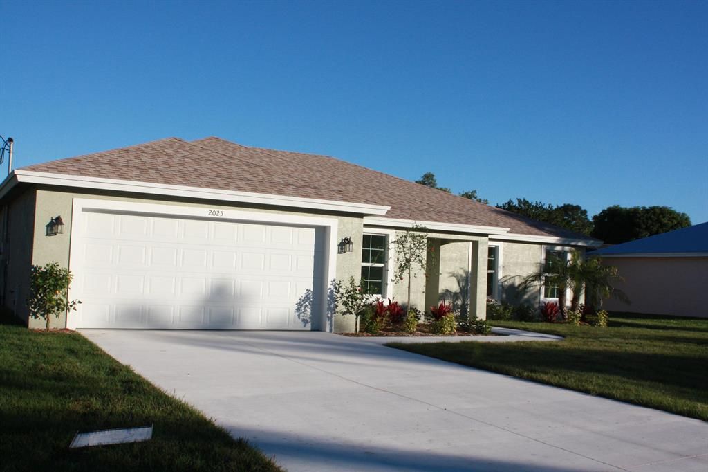Photo of 2025 SE Buttonwood Drive, Port Saint Lucie, FL 34953 (MLS # R10766372)