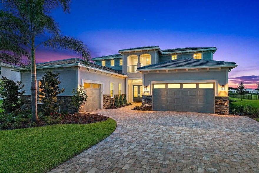 Hottest community in Jupiter.
Brand new construction; never lived in home; built by DiVosta on .95 Acre lot directly on the lake. 
Maderia model with casita (guest house) boasts the primary bedroom, 2 guest suites and flex room on the main floor with a loft and additional bedroom and bath on the upper floor. Casita out back on main level. This home has many upgraded features including crown molding throughout and pre-wiring for pool, spa and backup generator.