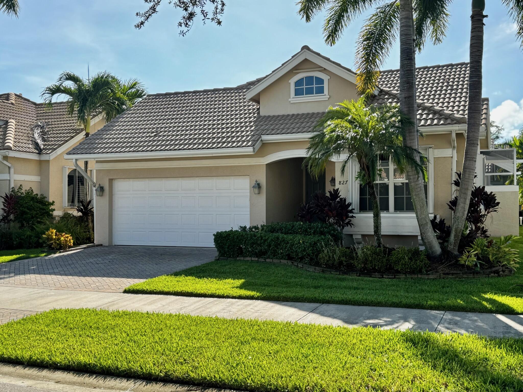 Welcome to this beautifully maintained CBS courtyard pool home in the desirable gated community of Lake Charles in St. Lucie West. Built by Hanover Homes in 2004, this unique layout offers the perfect combination of privacy, flexibility, and Florida outdoor living.Step inside to discover an open-concept floor plan that seamlessly connects the living, dining, and kitchen areas--perfect for entertaining or everyday living. The spacious kitchen features ample cabinetry, a breakfast bar, and direct views of the pool courtyard, The split floorplan offers 2 bedrooms and 2 baths with a den that can be used as a study/office. Private entrance to 1 bedroom/1 bath studio features direct access to the pool and main house.