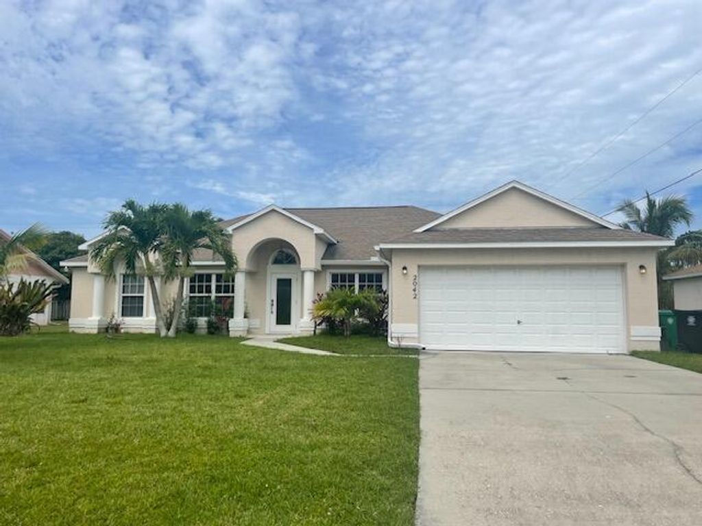 Photo of 2042 SE Camilo Street, Port St Lucie, FL 34952 (MLS # R10901079)
