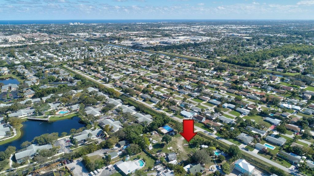 Photo of 3865 Aladdin Avenue, Boynton Beach, FL 33436 (MLS # R11159837)