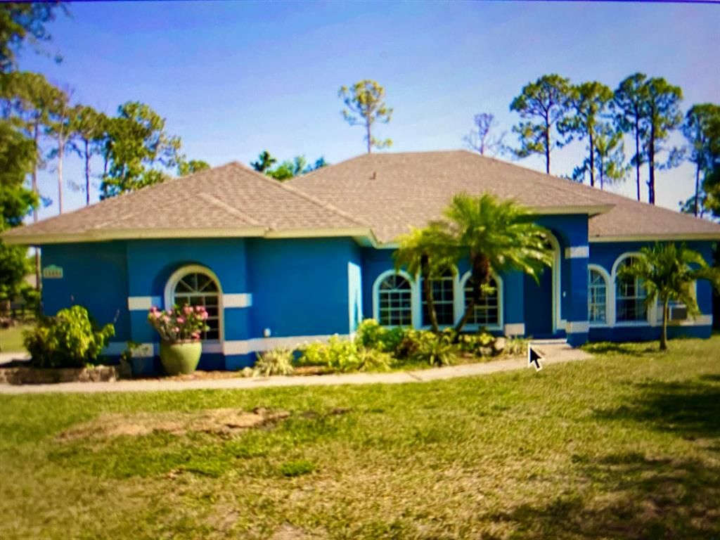 Photo of 15856 76th Road N, Loxahatchee, FL 33470 (MLS # R10730804)
