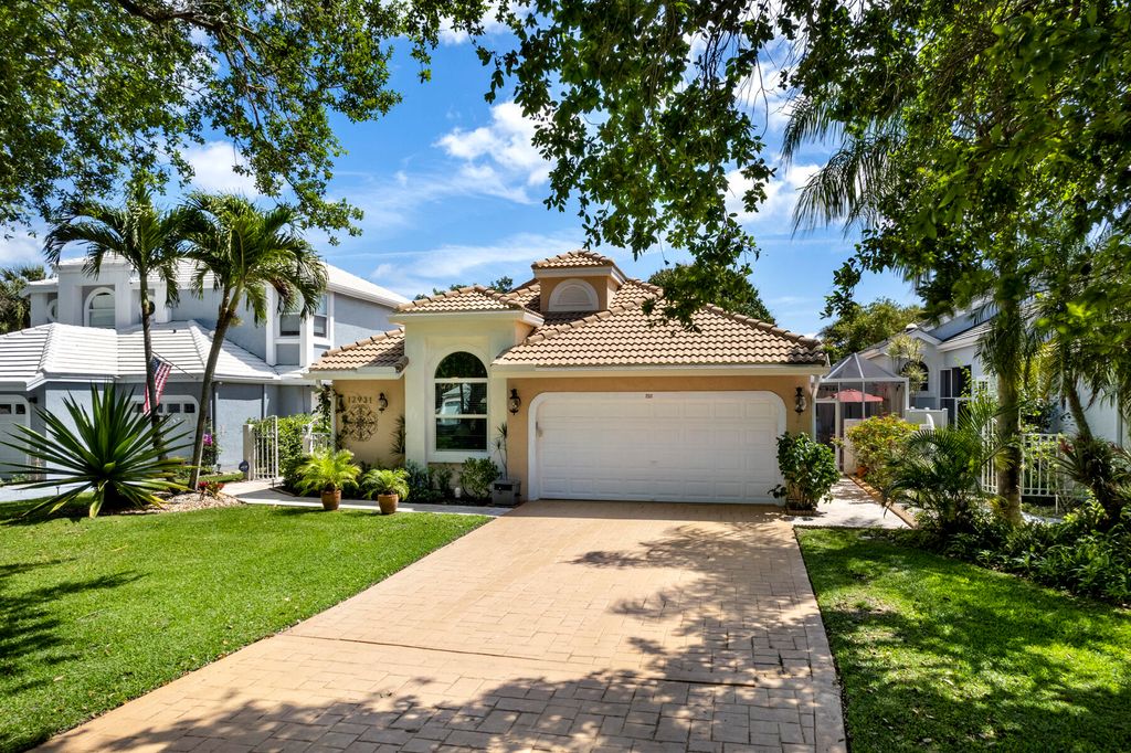 Photo of 12931 Oak Knoll Drive, Palm Beach Gardens, FL 33418 (MLS # R10972098)