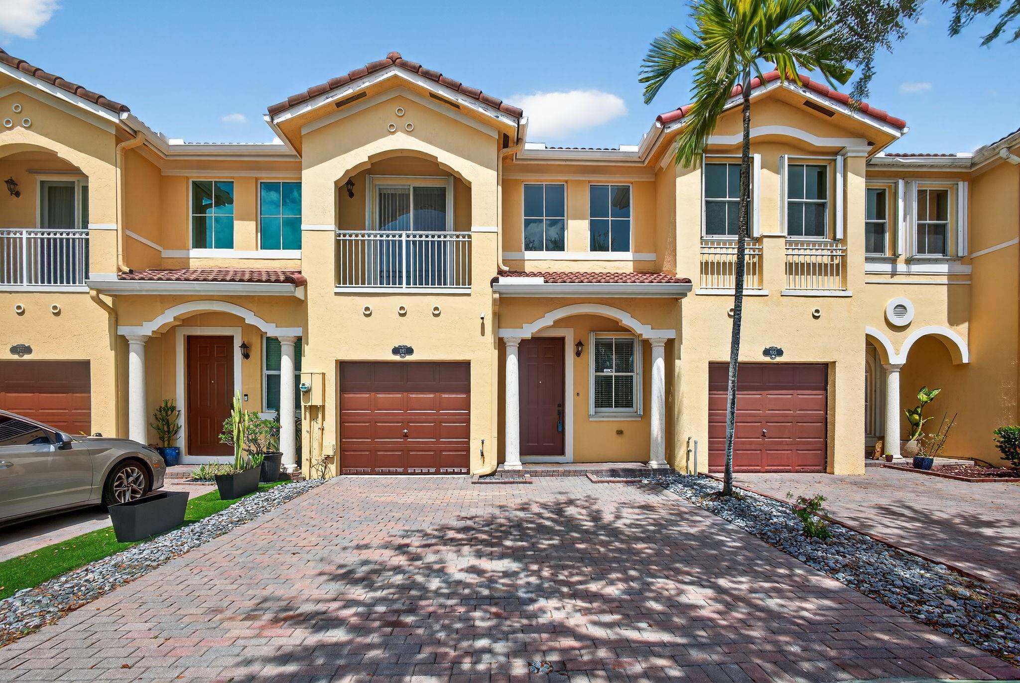 Step into style and comfort in this stunning 2-story 3 Bed 3 Bath 1 car garage townhouse. Built in 2004 and recently remodeled top to bottom, this home offers modern living with timeless appeal • You'll love the spacious layout featuring 1 Bed and 1 Bath downstairs, 24" x 24" ceramic tile throughout the first floor and warm wood floors upstairs. The kitchen is a showstopper—completely redesigned with new appliances, sleek top-of-the-line cabinetry, perfect for everyday cooking or entertaining. All bathrooms have been beautifully updated •The dreamy oversized master closet is the kind of space you didn’t know you needed (until now!)•Accordion shutters on all openings provide peace of mind, while the private backyard with artificial turf means zero lawn maintenance and year-round greenery.