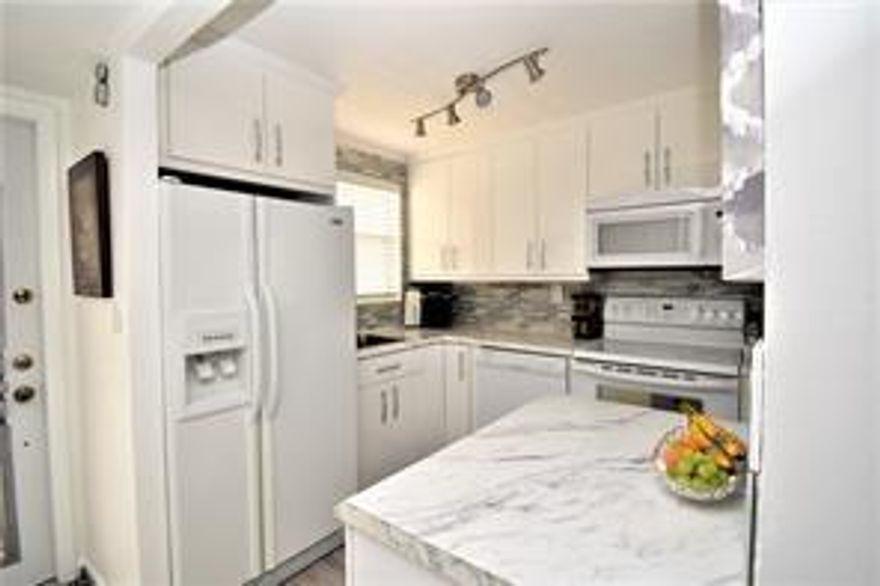 Bright and open 1/1 condo in Phase 3 of Sunrise Lakes community Building #72, 55+ community
Enjoy the convenience of being right across from the clubhouse, plus a second-floor location close to the elevator and laundry facilities. Wood laminate flooring throughout, open concept kitchen with island and hurricane impact windows. Water, Cable, Internet, appliance repair and pest control included. 
Furniture is negotiable or can be removed.
A beautiful and relaxing view of the lake and easy access to everything the community offers.