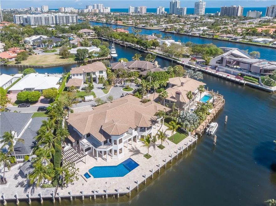 This magnificent 2-story estate exudes modern elegance from every angle. With exceptional luxurious design selection and uniquely glamorous style, this home is perfectly suited for a princess. Boasting 170' WF, 2 docks, 8 suites, 9.5 baths, a Cesar kitchen, Wolf & Sub-Zero appliances, fitness/spa room, bar/game room, executive office, VIP suite, Captain's Suite, 1,600sf Master, 280+ bottle glass enclosed wine room, 6,000sf of outdoor space, a 27' high dome ceiling foyer and of course, a Secret Passage.