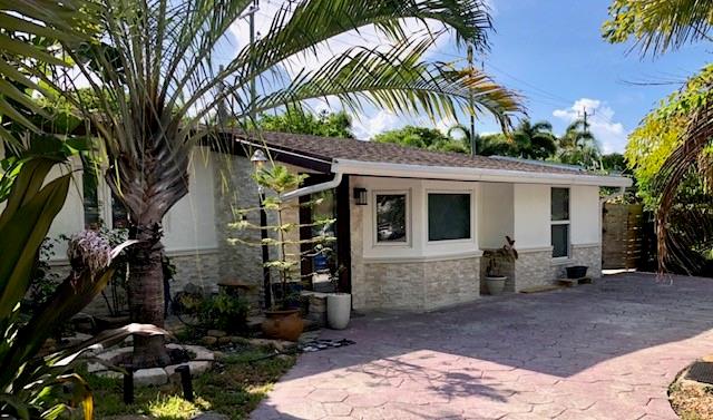 Nice, well kept neighborhood remodeled house. 4 BEDROOM 2 BATH home with all IMPACT WINDOWS, Brand NEW A/C units, Brand NEW dryer and WOOD LOOK flooring plus updated bathrooms. Large Foyer entry area. Plenty of storage and closet space. Oversized Family/TV Room with garden views and a Spacious Tropical feel backyard with a shed and very large BBQ/Sitting area.