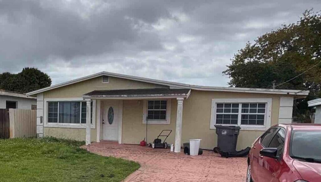 Photo of 4250 SW 24th Street, West Park, FL 33023 (MLS # B26010465)