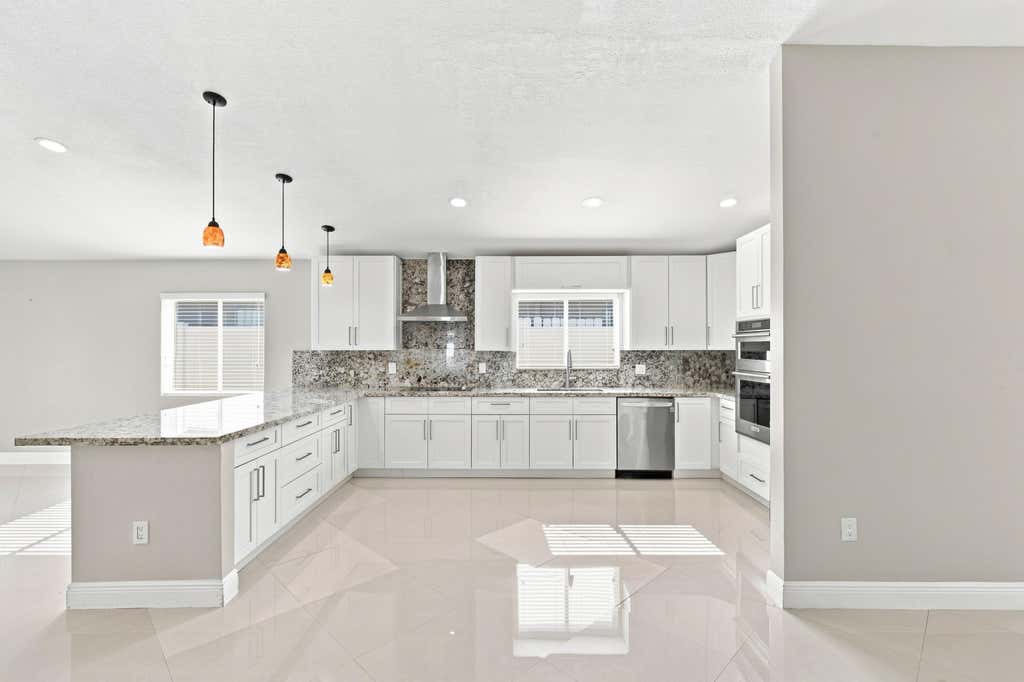 Photo of 13513 NW 7TH Street, Plantation, FL 33325 (MLS # B26058692)
