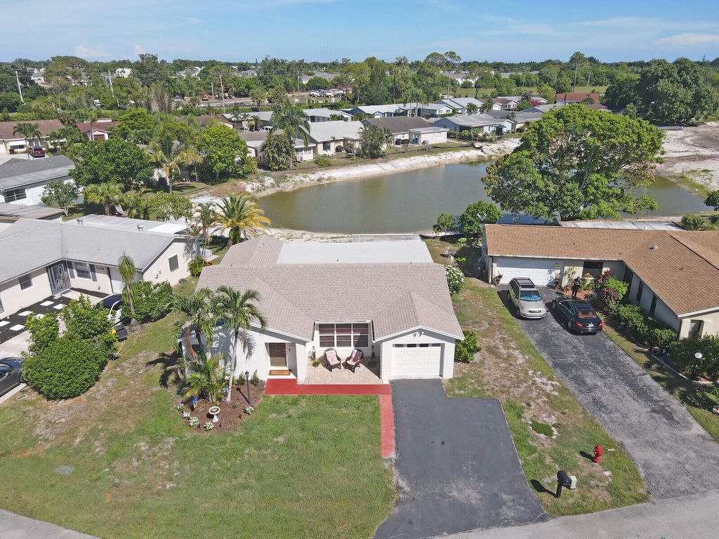 Photo of 7116 Pine Bluff Drive, Lake Worth, FL 33467 (MLS # R11148690)