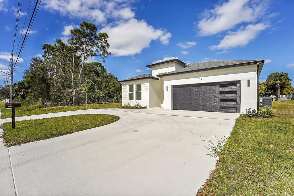 Photo of 1071 SW Becker Road, Port Saint Lucie, FL 34953 (MLS # R11056084)