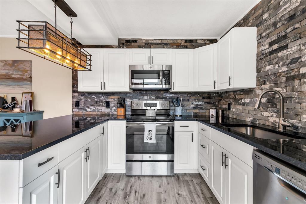 Photo of 3167 Gardens East Drive #A, Palm Beach Gardens, FL 33410 (MLS # R10777489)