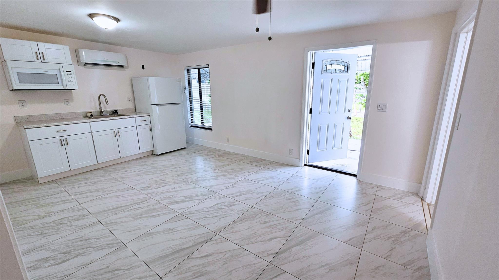 Charming, renovated studio apartment in Oakland Park.
Step into this bright, efficient space thoughtfully designed to make everyday living comfortable and easy. Enjoy built-in storage and access to a shared yard that invites you to relax outdoors or unwind after a long day. Residents appreciate the convenience of an on-site washer and dryer at no extra cost. Located in a peaceful, friendly neighborhood surrounded by beautiful parks and tree-lined streets, this home offers a sense of community while staying close to everything you love—just minutes from the beach, vibrant Wilton Drive, and downtown Oakland Park’s excellent restaurants, breweries, and local events. Quick application process. Tenant pays a flat fee of $125/month covering electricity, water, trash, landscaping, and internet.
