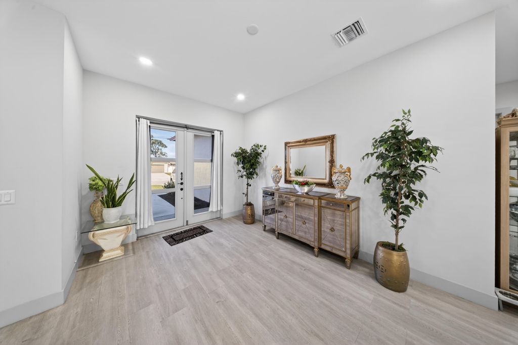 Photo of 1633 SW Davis Street, Port Saint Lucie, FL 34953 (MLS # B26019560)