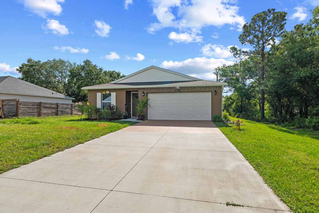 Photo of 8756 103rd Ave, Vero Beach, FL 32967 (MLS # B26000870)