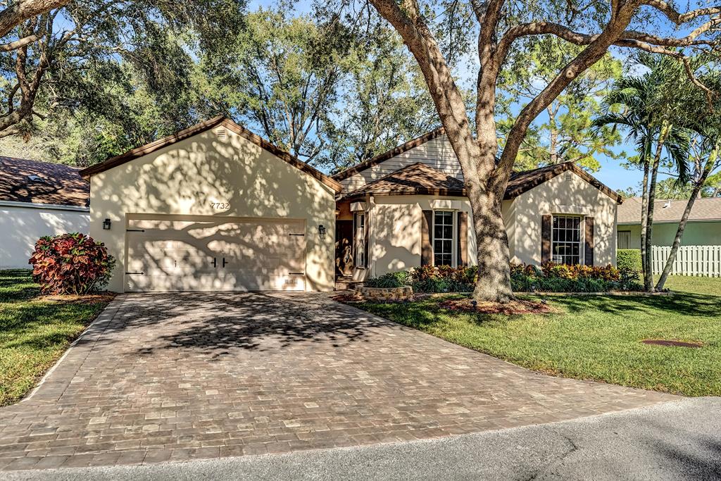 Beautiful home on corner lot with lake in the rear and lake view from the front. Ceramic tile throughout. New window treatments and automatic roll down hurricane shutters.