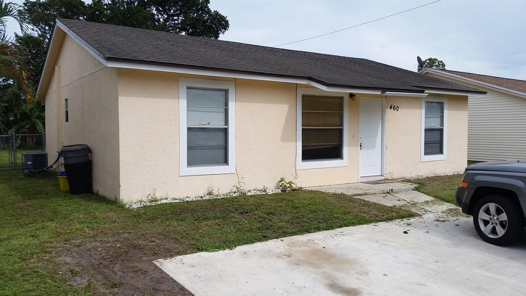 Photo of 460 Fleming Avenue, Greenacres, FL 33467 (MLS # B26046487)