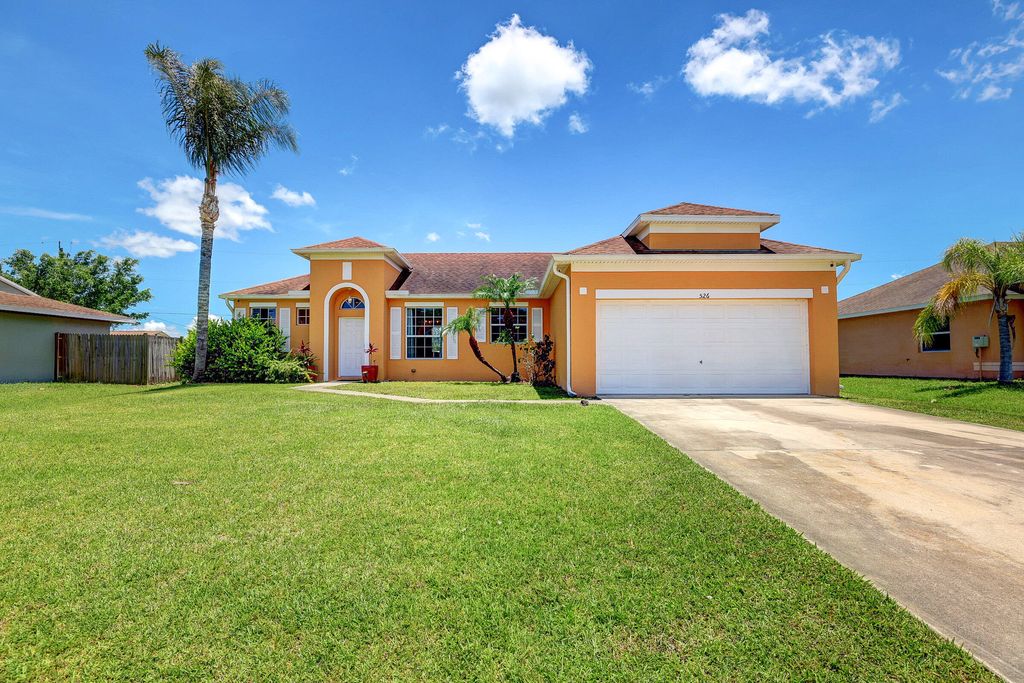 Photo of 526 SW Butler Avenue Ave, Port Saint Lucie, FL 34953 (MLS # R10812035)