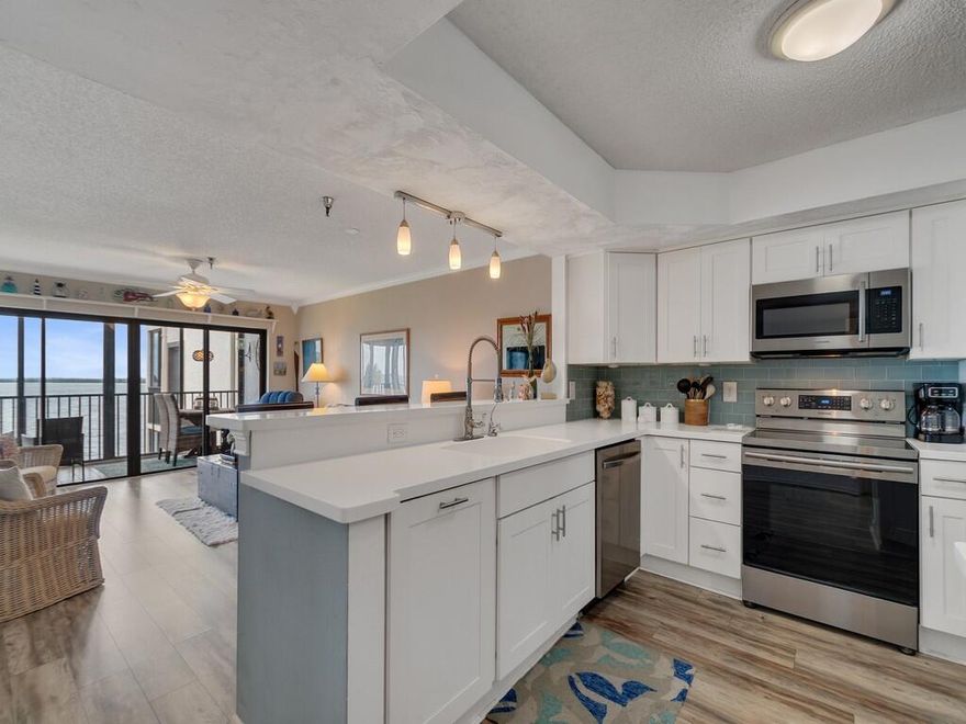 Wake up to peaceful Intracoastal views in this 2-bedroom, 2-bath condo at Pelican Pointe. This bright, well-maintained unit features an open living space and a private balcony ideal for enjoying coastal breezes and waterfront sunsets. Located in a gated community with access to resort-style amenities including a pool, tennis, clubhouse, pickle ball courts, 9 hole golf course and day docks, all just minutes from Sebastian's beaches, dining, and local charm. Added living space with enclosed porch. Includes under building parking and views to fall in love with! Sizes approx and subj to error.