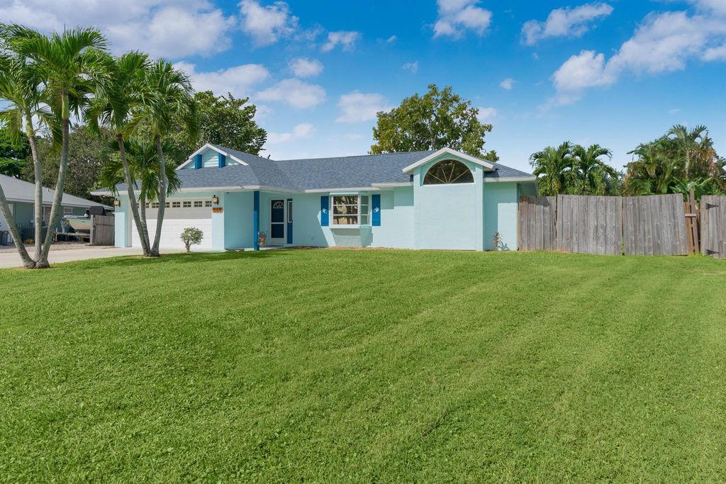 Photo of 569 NE Lima Vias, Jensen Beach, FL 34957 (MLS # R10934665)
