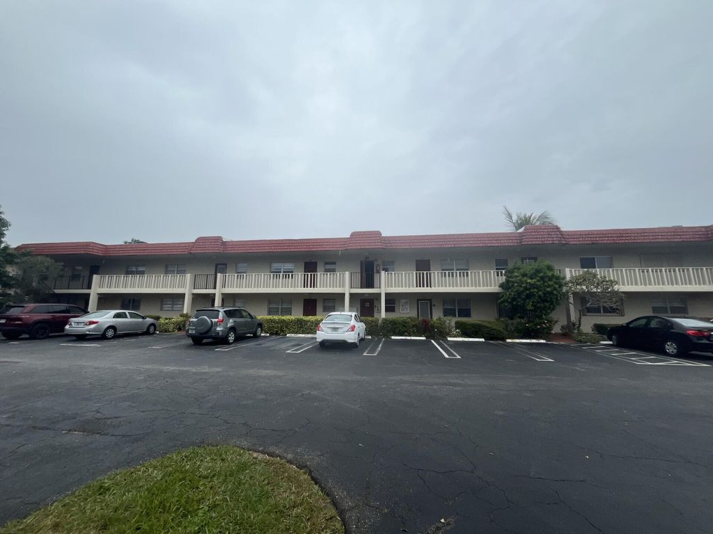 Photo of 21 Abbey Lane #104, Delray Beach, FL 33446 (MLS # R11161523)