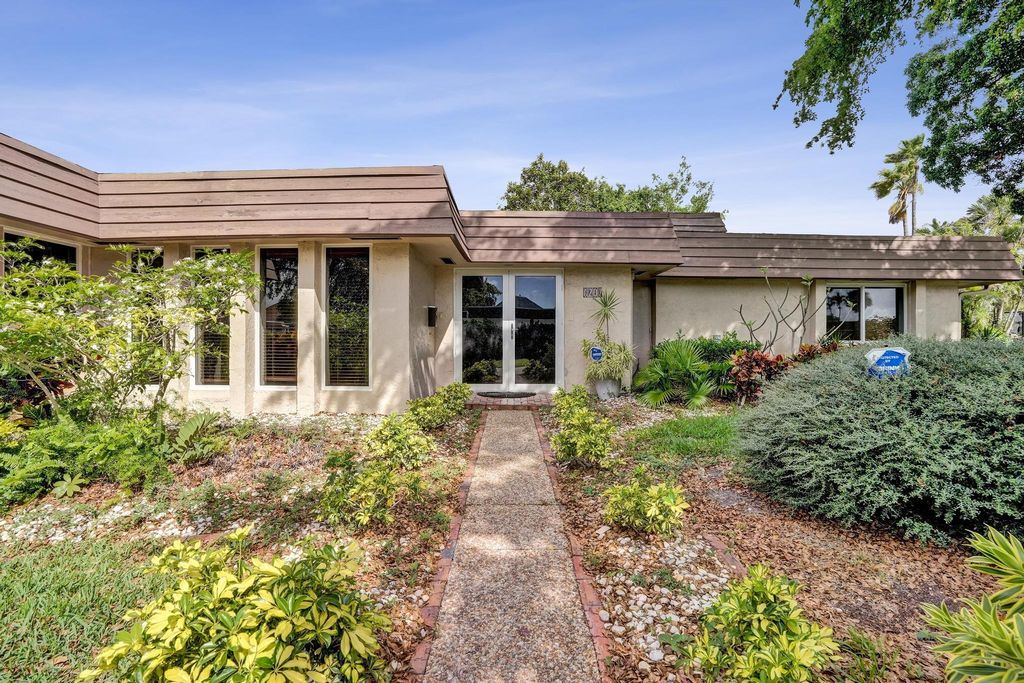 Photo of 6207 Jacaranda Circle, Tamarac, FL 33319 (MLS # B26011848)