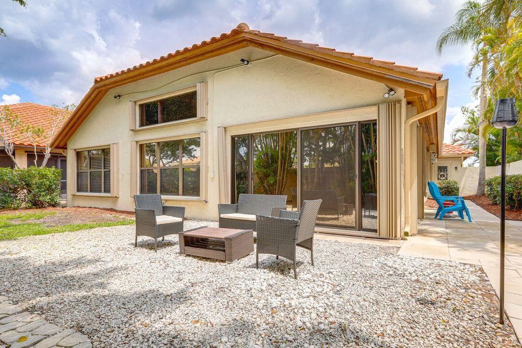 Photo of 2856 SW Mariposa Circle, Palm City, FL 34990 (MLS # B26024763)