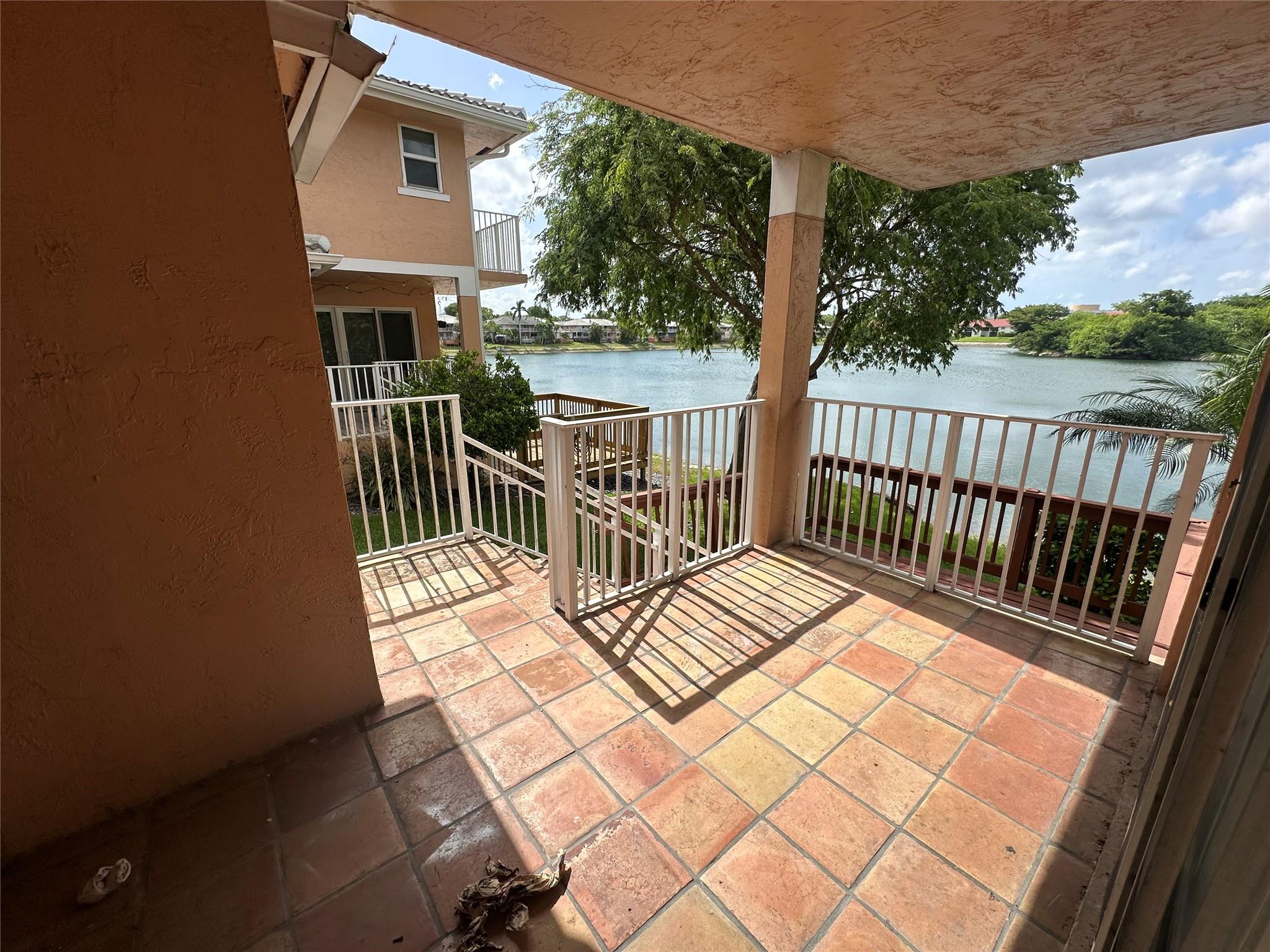 Priced to sell needs a roof will not last long, only available unit for sale in the neighborhood! Property is being sold as-is and is priced accordingly. Fee simple homeowners association don't miss this opportunity! Gated community