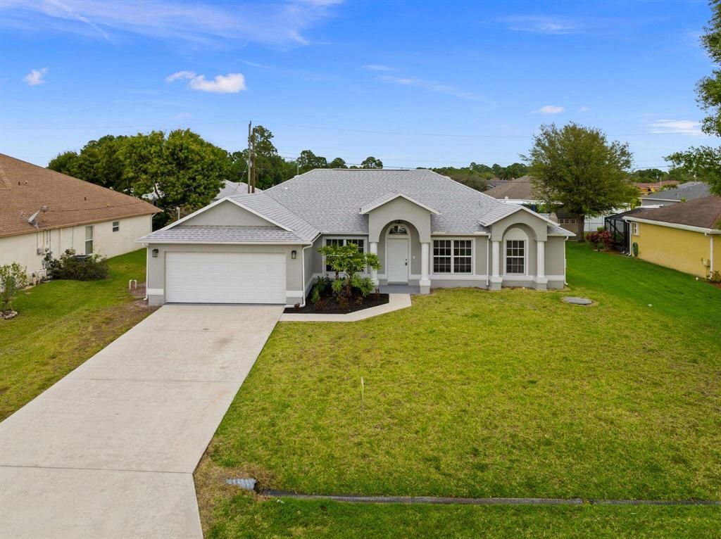 Photo of 1431 SW Dimperio Avenue, Port St Lucie, FL 34953 (MLS # R10874650)