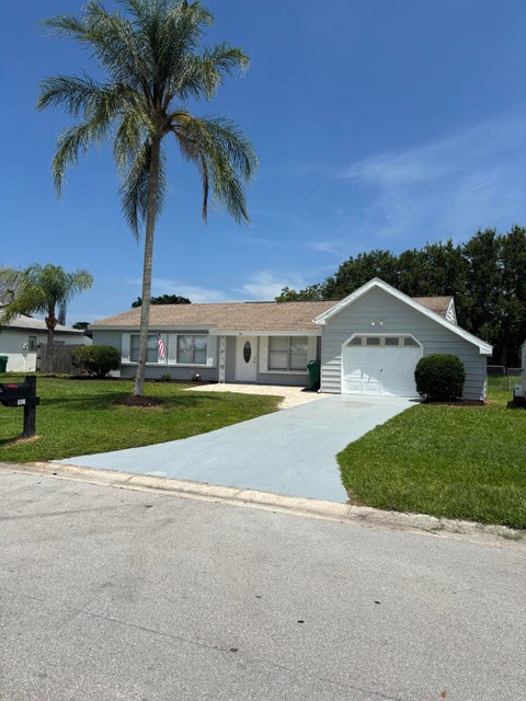Photo of 1921 SE Oxmoor Terrace, Port Saint Lucie, FL 34952 (MLS # B26045039)