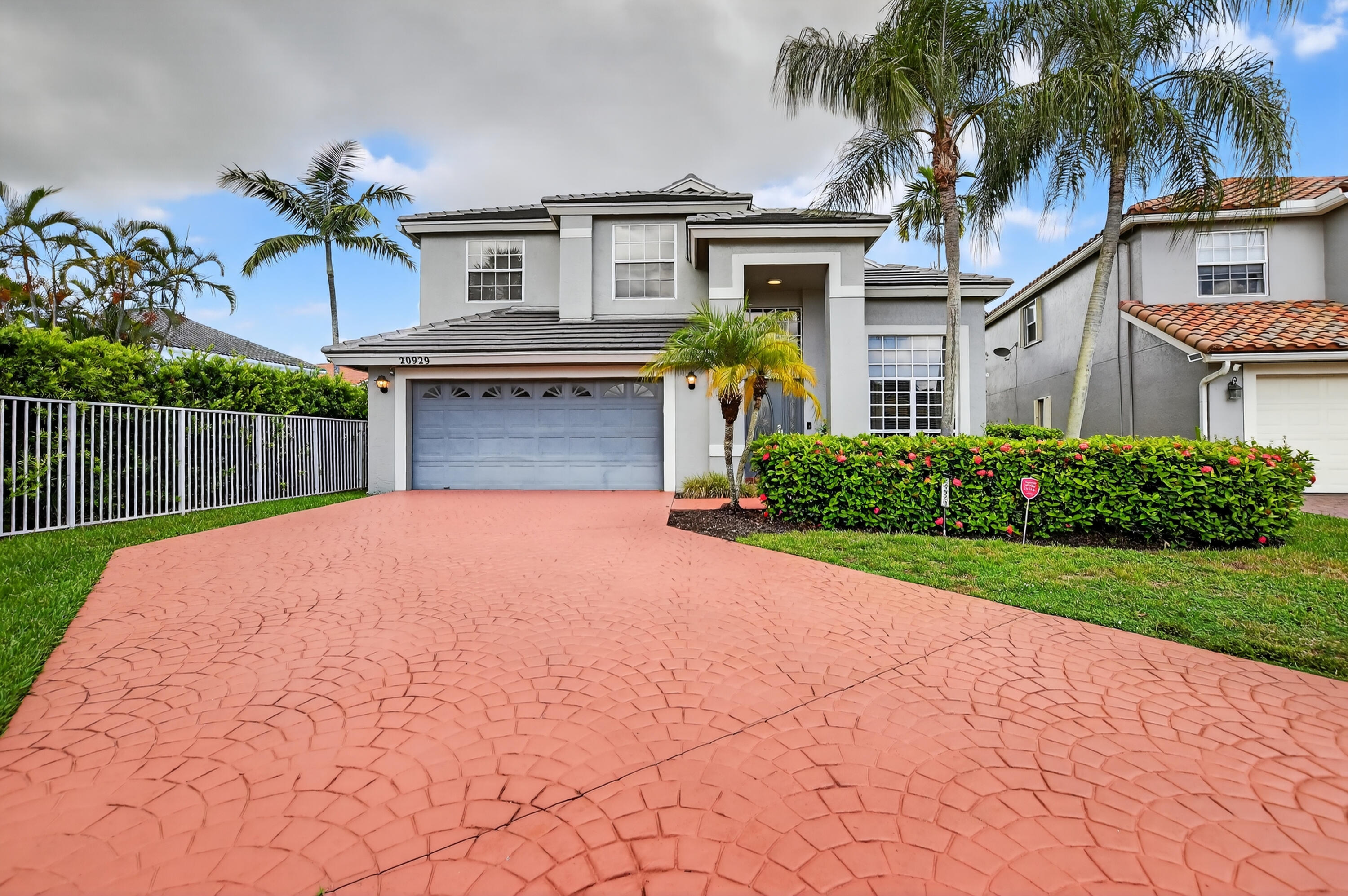 Your dream Boca Raton lifestyle starts here! Tucked away on a quiet cul-de-sac in the coveted Mission Bay community, this 4-bedroom, 3-bath beauty combines stylish updates, functional living space, and resort-inspired amenities.Step inside and feel instantly at home in the spacious family room, perfect for gatherings. The heart of the home is the stunning updated kitchen with a center island, upgraded cabinetry, Quartz countertops, and stainless steel appliances -- ideal for cooking, entertaining, and making memories. All bathrooms have been beautifully remodeled, and a brand-new roof means peace of mind for years to come.Outside, the oversized fenced backyard offers endless possibilities -- from outdoor dining and BBQs to a private play space or future pool. Living in Mission