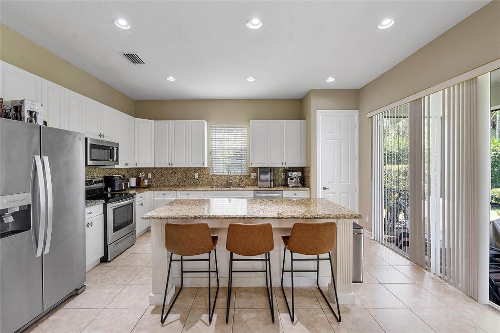 Photo of 8244 NW 107th Terrace, Parkland, FL 33076 (MLS # F10546013)