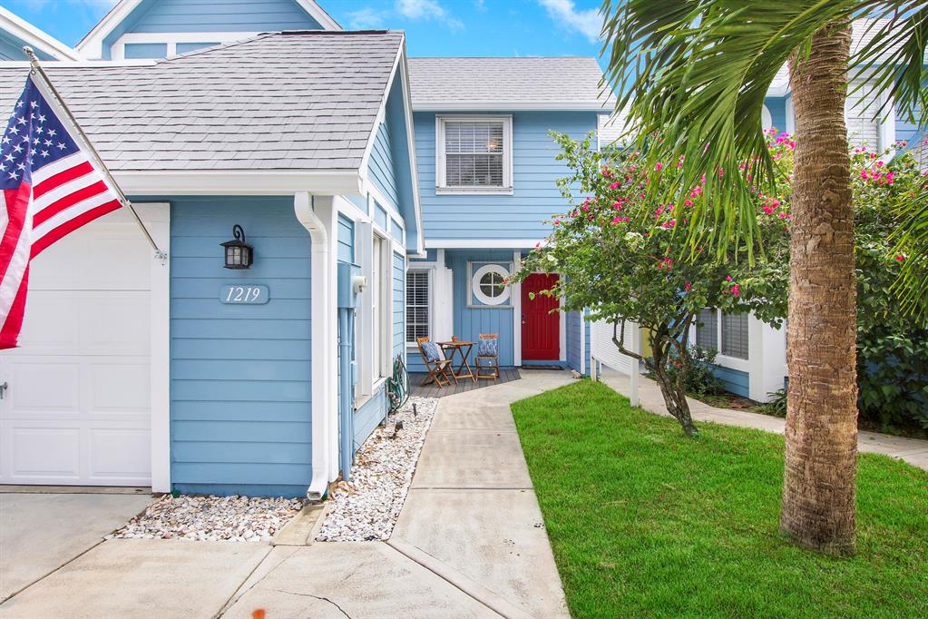 Experience the beachside lifestyle from your 3 bedrooms, 2.5 baths private 1-car garage vacation home located in the pet friendly gated community of Ocean Dunes! You will love the seamless blend of indoor and outdoor living in this spectacular townhome on the water, less than 2 blocks to the beach! First floor has magnificent volume ceiling, large open concept eat-in kitchen with all new stainless steel appliances, granite countertops, dining area, screened in patio and large private deck situated on the lake!