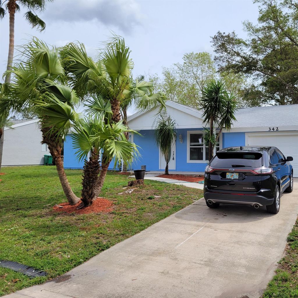 Photo of 342 SW Kentwood Road Rd, Port St Lucie, FL 34953 (MLS # R10792179)