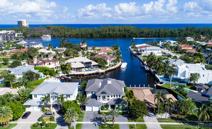 Newer Spectacular Deepwater Pool Home with Wide Canal Basin View to the Intracoastal. 20,000 lb Boat Lift, Impact Windows and Doors, 4 Bryant A/C Units, Custom Brazilian 8' Mahogany Front Door, Gourmet Kitchen with all Thermador appliances, Wholehouse Generator, Lutron Lighting System, Walk-in Wine Cellar, Pub Room with full bar, 1st and 2nd floor Laundry Rooms, Private Covered Balcony off Master Suite and Guestroom Suite, Marble deck, Summer Kitchen with Pizza Oven, Sink and Refrigerator, Infinity Pool and Spa, Outdoor Fireplace, East Exposure and so much more! See additional features in Supplement Section. Property Features:
Smart Home
Elevator
Hardwood Floor throughout
Concrete 2nd floor deck
12 exterior cameras
Custom Brazilian 8' Mahogany Front Door with 2' Glass transoms
4 Bryant A/C Units
Walk-in wine cellar
Sprayfoam insulation
Lutron Lighting System
Thermostats controlled by phone
Open staircase with open view to foyer
Impact Windows and Doors
10' High WinDoor Sliders
Whole House Generator
All concrete blocks filled with insulation
Low E Energy efficient windows
Surround sound separate zoned speakers in each room
1st and 2nd floor laundry rooms both with separate deep laundry tub/sink plus custom cabinets

Pub Room with full bar
Purified water chiller in Pub
Under counter lights under all Pub shelves
Ice Maker in Pub
Refrigerator

Gourmet Kitchen with large sit-down island
All Thermador Appliances
Custom made Kitchen cabinets
Double Wall Oven
Warming drawer in kitchen
Water pot filler over stove
Under counter lights in kitchen
Walk-in pantry

20,000lb Boat Lift
Roll down sunscreen in back
East Exposure
Wide Canal Basin View to Intracoastal

Marble deck set in concrete
Summer Kitchen with Pizza Oven, sink and refrigerator
Exterior gas hot water heaters with recirculating pump
Infinity Pool and Spa
Pool chiller and pool heater
Outdoor fireplace
iAqualink for pool


Front Covered Balcony off guestroom suite
Large Walk-in closet in all suites

Private Covered Balcony off Master Bedroom
Sitting area in Master Bedroom suite
Morning bar with refrigerator in Master Bedroom suite
Large Walk-in closet with island in Master Bedroom suite
Large soaking tub in Master Bath