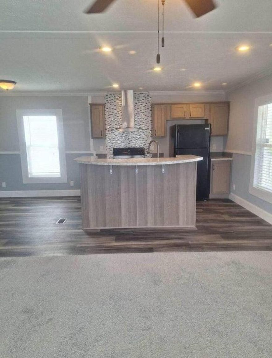 This 3/2 beach‑cottage style manufactured home is an investor's dream, with tenants already in place and covering all expenses for the next year. Enjoy Indian River breezes from the covered patio and an open kitchen, living, and dining layout with fresh paint, new appliances, new carpet, and ample closet space. The property includes a carport, storage shed, and generous parking. Located in a quiet, gated community featuring a year‑round heated pool, clubhouse, billiards and card room, and a small gym. Just 2 miles from the beach and the Fort Pierce Marina's restaurants and entertainment. Lot fee is $775 and includes taxes, and investors may rent without restrictions.