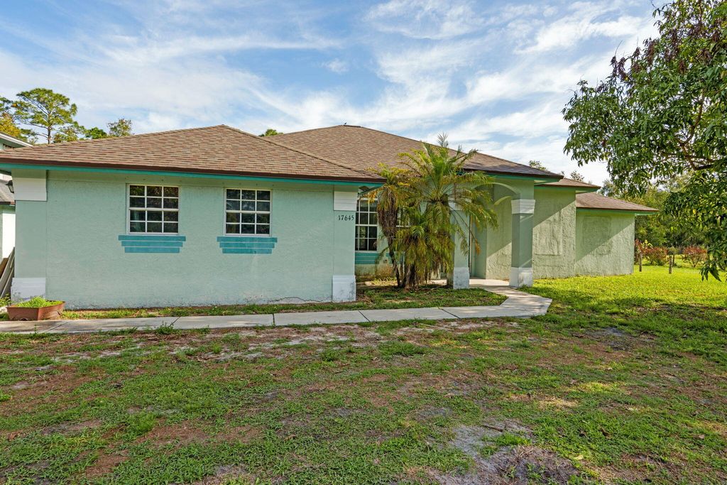Photo of 17645 N 77th Ln Lane N, The Acreage, FL 33470 (MLS # B26015147)