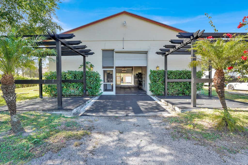 Photo of 11231 IRA Lane, Lake Worth, FL 33449 (MLS # B26064287)