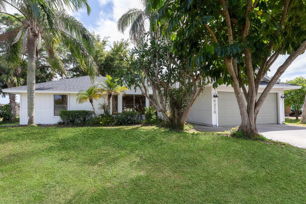 Photo of 4328 SW Jarmer Road, Port Saint Lucie, FL 34953 (MLS # R10965494)