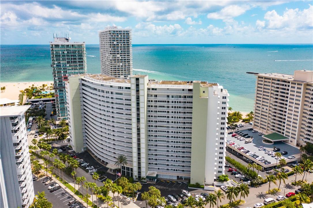 Ocean views and seasonal rental! This updated and well-kept apartment is fully furnished and ready for your winter getaway. Highlights include an updated kitchen with beautiful cabinets, travertine floors, quality furniture, and all kitchenware and linens—plus a washer & dryer in the unit. Conveniently located just 15 minutes from Fort Lauderdale International Airport and Port Everglades, close to Las Olas with its fantastic restaurants, and about 40 minutes to Downtown Miami. Escape the cold and enjoy sunny Florida living—everything you need for a comfortable stay in paradise! Minimum rental term: 4 months.