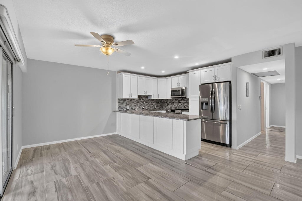 Photo of 204 DORSET E, Boca Raton, FL 33434 (MLS # B26092295)