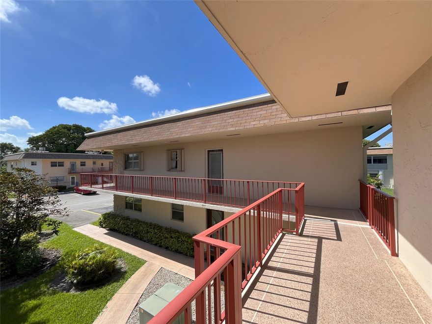 Outstanding corner unit featuring one bedroom and one bathroom, with a rare double-wide balcony overlooking the lush, resort-style courtyard and pool area. Bright and inviting with beautiful green views, this freshly painted residence offers a peaceful setting and an ideal spot to enjoy Florida living. Includes central air and an updated bathroom. Located in the desirable Oxford building of Century Village, a premier 55+ community with exceptional amenities. Leasing permitted once per ownership, per association rules.